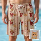 Man wearing Men's Jolly Jingle Custom Cat Face Beach Shorts — custom faces printed all-over