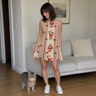 Full-length photo with the pet printed all over this Women's Jolly Jingle Custom Cat Face Tank Dress