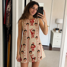 Real-life photo of someone wearing Women's Jolly Jingle Custom Face Tank Dress — custom faces printed all-over