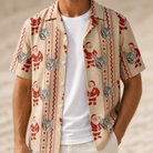 Man wearing Men's Jolly Jingle Custom Cat Face Hawaiian Shirt open over a white tee