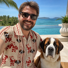 Selfie with the pet whose face is printed all over this Men's Jolly Jingle Custom Dog Face Hawaiian Shirt