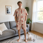Full-length photo with the pet printed all over this Men's Jolly Jingle Custom Cat Face Shirt & Shorts Set
