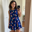 Real-life photo of someone wearing Women's Boxed Bliss Custom Face Tank Dress — custom faces printed all-over