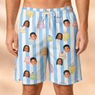 Model wearing Men's Icing Illusion Custom Face Beach Shorts printed with kids' faces