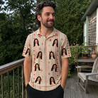 Real-life photo of someone wearing Men's Glow Gala Custom Face Polo Shirt — custom faces printed all-over