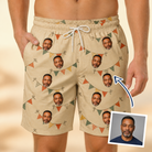 Man wearing Men's Candle Confetti Custom Face Beach Shorts — custom faces printed all-over