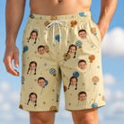 Model wearing Men's Sugar Spin Custom Face Beach Shorts printed with kids' faces