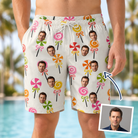 Man wearing Men's Lolli Jubilee Custom Face Beach Shorts — custom faces printed all-over