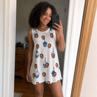 Real-life photo of someone wearing Women's Cupcake Countdown Custom Face Tank Dress — custom faces printed all-over