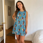 Real-life photo of someone wearing Women's Birthday Bunting Custom Face Tank Dress — custom faces printed all-over