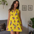 Real-life photo of someone wearing Women's Mirrorball Mischief Custom Face V-Neck Dress — custom faces printed all-over