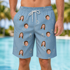 Model wearing Men's Carat Chaos Custom Face Beach Shorts printed with kids' faces