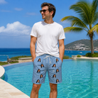 Real-life photo of someone wearing Men's Carat Chaos Custom Face Beach Shorts — custom faces printed all-over