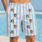 Model wearing Men's Henhouse Hues Custom Face Beach Shorts printed with kids' faces