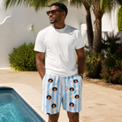 Real-life photo of someone wearing Men's Henhouse Hues Custom Face Beach Shorts — custom faces printed all-over