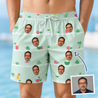 Man wearing Men's Margarita Mayhem Custom Face Beach Shorts — custom faces printed all-over