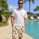 Real-life photo of someone wearing Men's Champagne Chill Custom Face Beach Shorts — custom faces printed all-over