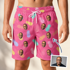Man wearing Men's Citrus Splash Custom Face Beach Shorts — custom faces printed all-over