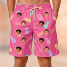 Model wearing Men's Citrus Splash Custom Face Beach Shorts printed with kids' faces