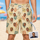 Man wearing Men's Strap Squad Custom Face Beach Shorts — custom faces printed all-over