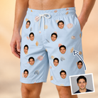 Man wearing Men's Shell Yeah Custom Face Beach Shorts — custom faces printed all-over
