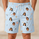Model wearing Men's Shell Yeah Custom Face Beach Shorts printed with kids' faces