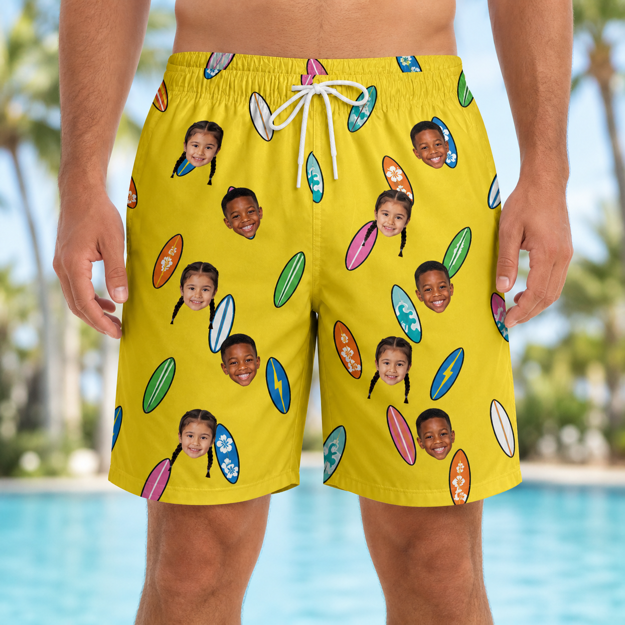 Model wearing Men's Board Buddies Custom Face Beach Shorts printed with kids' faces