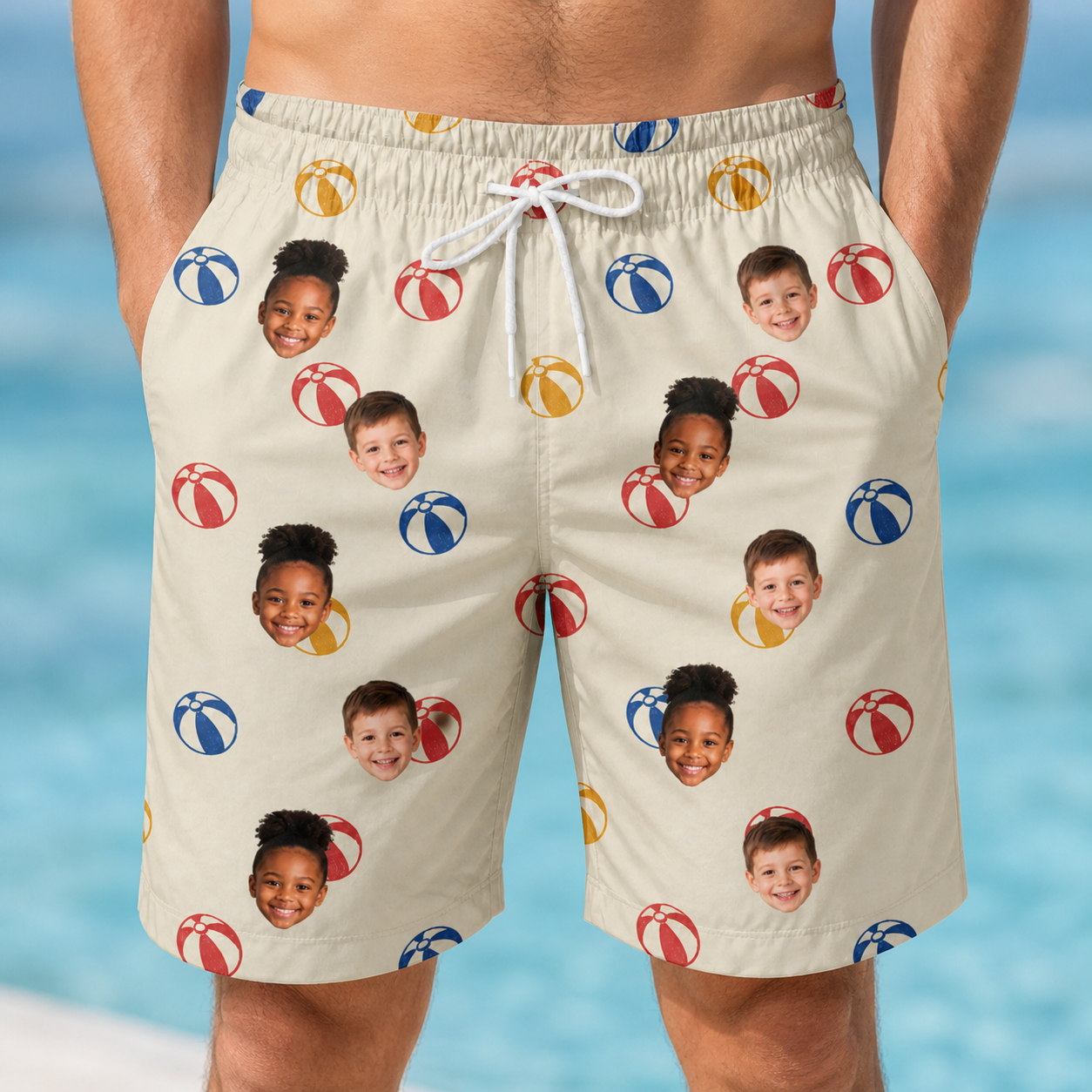 Model wearing Men's Sandy Sidekicks Custom Face Beach Shorts printed with kids' faces