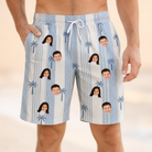 Model wearing Men's Coconut Crew Custom Face Beach Shorts printed with kids' faces