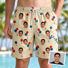 Man wearing Men's Balloon Brigade Custom Face Beach Shorts — custom faces printed all-over