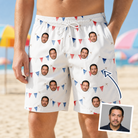Man wearing Men's Ruby Ruffles Custom Face Beach Shorts — custom faces printed all-over