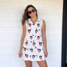 Real-life photo of someone wearing Women's Ruby Ruffles Custom Face V-Neck Dress — custom faces printed all-over