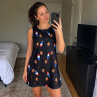 Real-life photo of someone wearing Women's Starsicle Swirl Custom Face Tank Dress — custom faces printed all-over