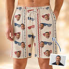 Man wearing Men's Firework Frames Custom Face Beach Shorts — custom faces printed all-over