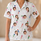 Model wearing Women's Boom Banner Custom Face Hawaiian Shirt printed with kids' faces