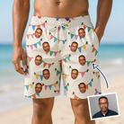 Man wearing Men's Folksy Flutter Custom Face Beach Shorts — custom faces printed all-over