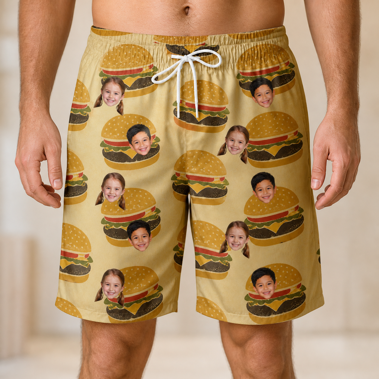 Model wearing Men's Patty Potluck Custom Face Beach Shorts printed with kids' faces