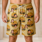 Model wearing Men's Patty Potluck Custom Face Beach Shorts printed with kids' faces