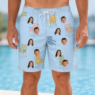 Model wearing Men's Folded Fellowship Custom Face Beach Shorts printed with kids' faces