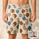 Man wearing Men's Upward Uproar Custom Face Beach Shorts — custom faces printed all-over