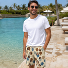 Real-life photo of someone wearing Men's Upward Uproar Custom Face Beach Shorts — custom faces printed all-over