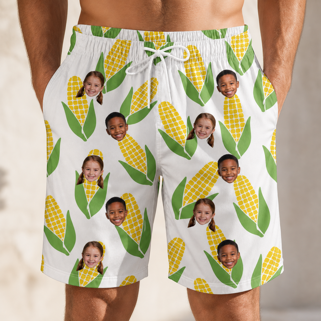 Model wearing Men's Cob Together Custom Face Beach Shorts printed with kids' faces