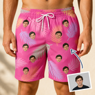 Man wearing Men's Swaying Sweethearts Custom Face Beach Shorts — custom faces printed all-over