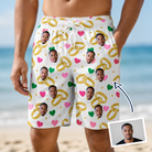 Man wearing Men's Saltkissed Circles Custom Face Beach Shorts — custom faces printed all-over