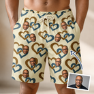 Man wearing Men's Cove Connections Custom Face Beach Shorts — custom faces printed all-over