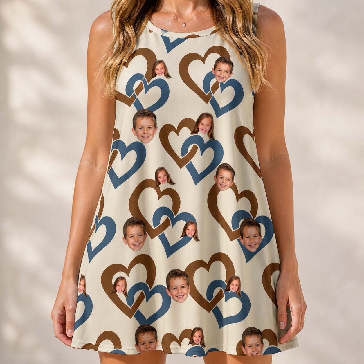 Model wearing Women's Cove Connections Custom Face Tank Dress printed with kids' faces
