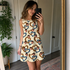 Real-life photo of someone wearing Women's Cove Connections Custom Face Tank Dress — custom faces printed all-over
