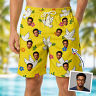 Man wearing Men's Dovebound Daydream Custom Face Beach Shorts — custom faces printed all-over