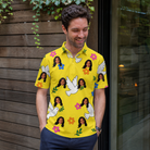 Real-life photo of someone wearing Men's Dovebound Daydream Custom Face Polo Shirt — custom faces printed all-over
