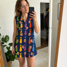 Real-life photo of someone wearing Women's Necktie Nostalgia Custom Face V-Neck Dress — custom faces printed all-over